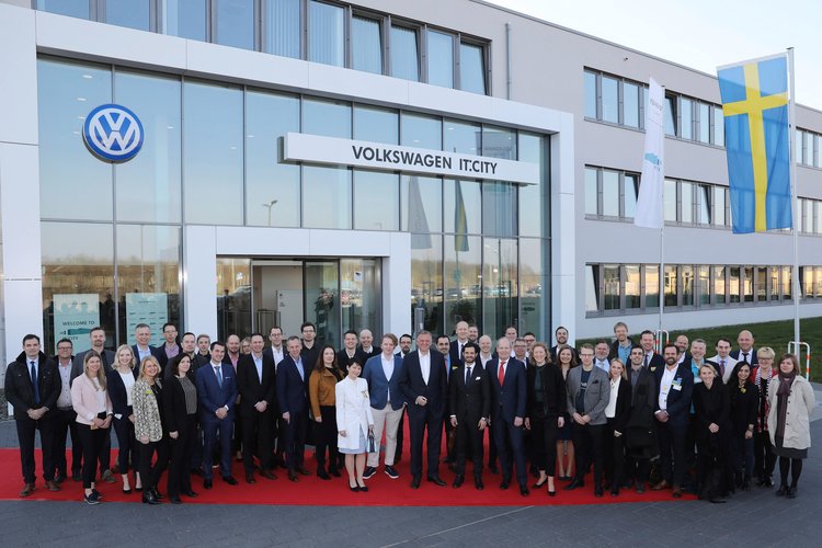 Group photo in front of Wolkswagen building