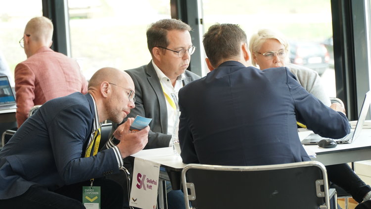 People discussing around table