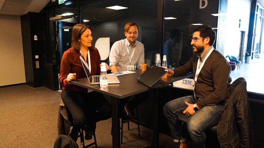 People discussing around table