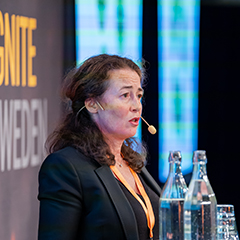 Woman talking into microphone